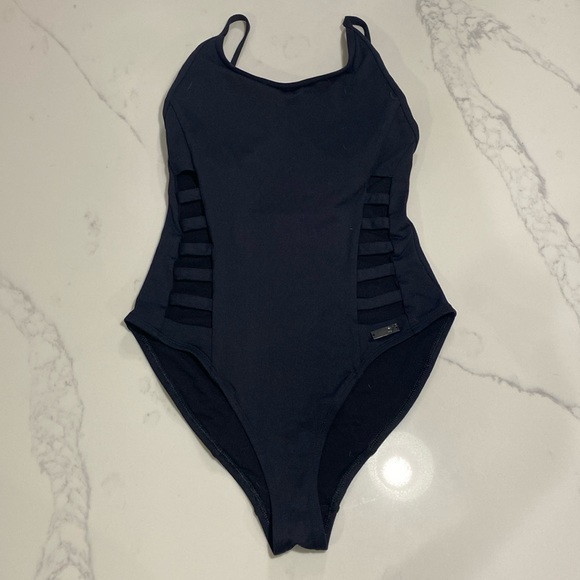 Other - Black swim suit with cut outs in abdomen area, size S